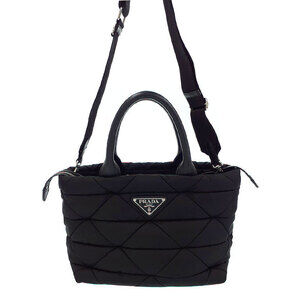 Prada Padded ReNylon Tote Bag black quilted bag triangle logo